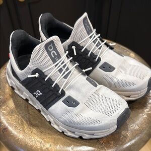 On Running White and Black Sneakers